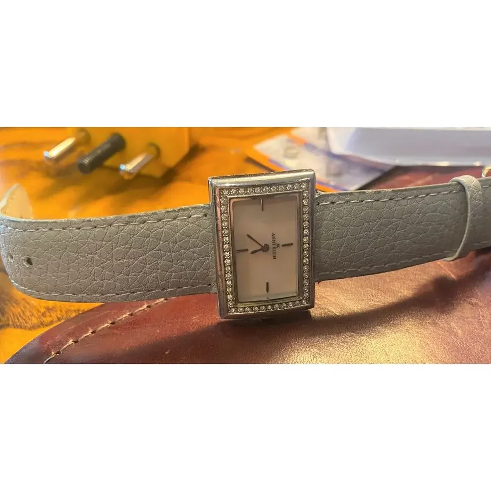Women's Anne Klein Watch, Silver Tone with Rhinestone Accents, Pink MOP Face